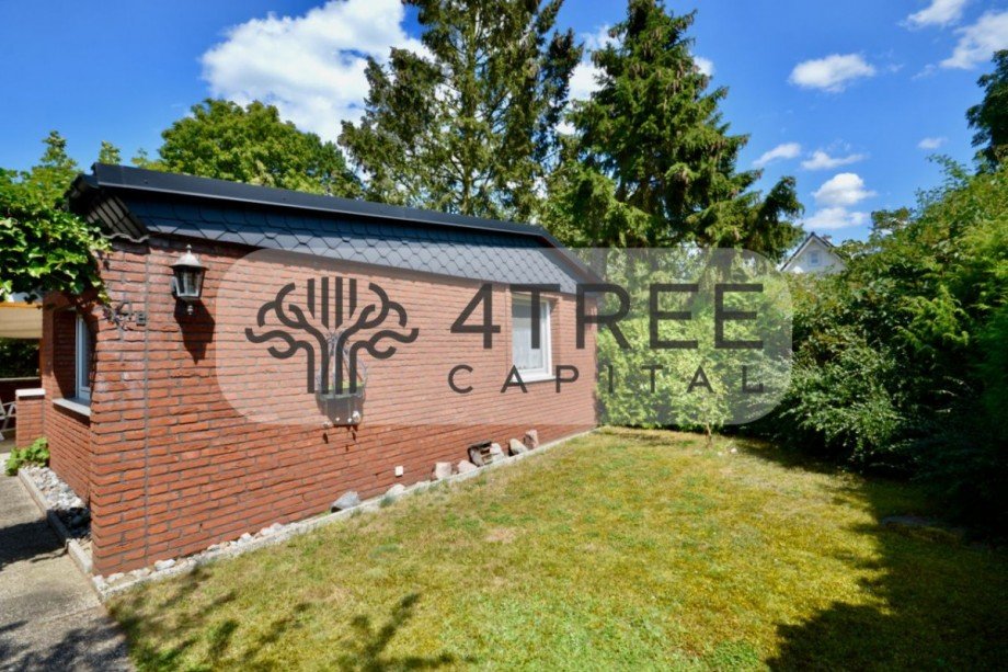 Verwunschener Eingang mit Garten Bungalow Lübeck