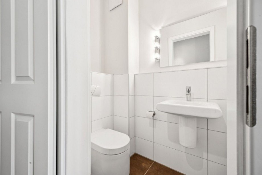 Modernes Gäste-WC Etagenwohnung Ahrensburg