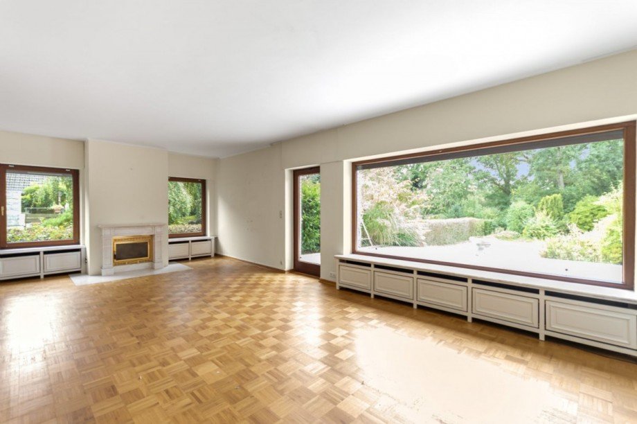 Wohnzimmer mit offenem Kamin Einfamilienhaus Großhansdorf