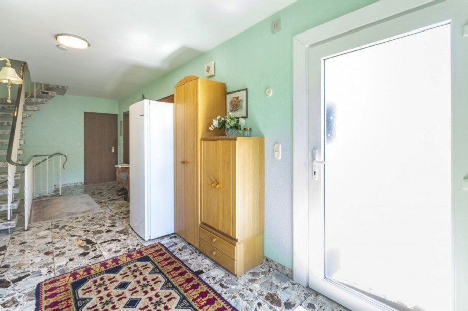 Helle Diele mit Eingangsbereich Einfamilienhaus Grünendeich