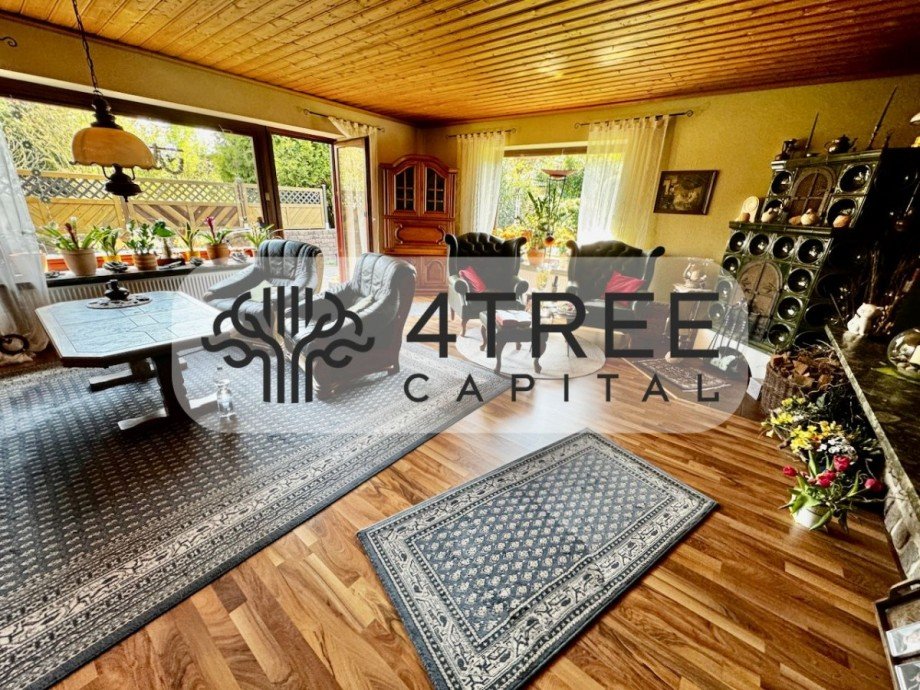 Helles Wohnzimmer mit Terrassenzugang Einfamilienhaus Schenefeld