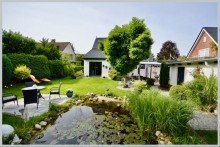 Eine Augenweide aus jedem Blickwinkel VERKAUFT! TOP-MODERNISIERTER GARTENTRAUM SUCHT NEUE FAMILIE