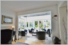Gemütlicher Loungebereich im Warmwintergarten VERKAUFT! TOP-MODERNISIERTER GARTENTRAUM SUCHT NEUE FAMILIE
