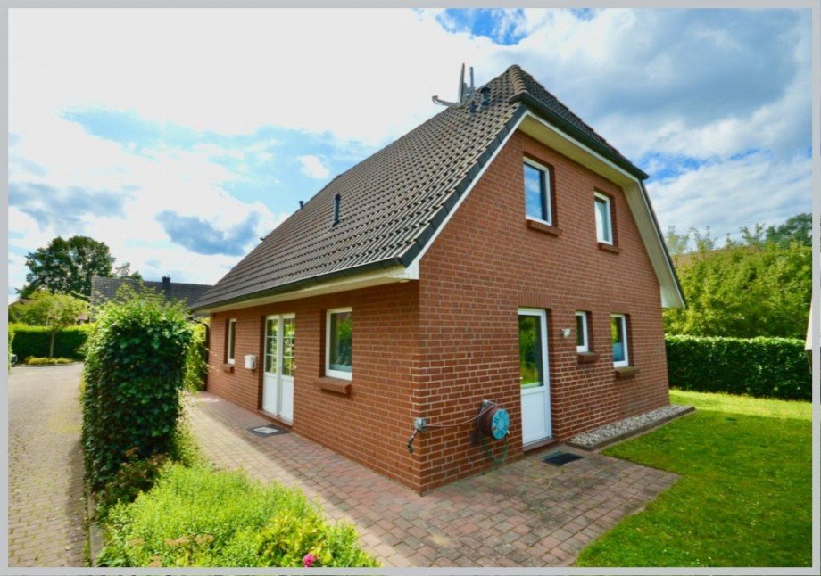 Hausrückseite mit Tür zum HWR Einfamilienhaus Jersbek
